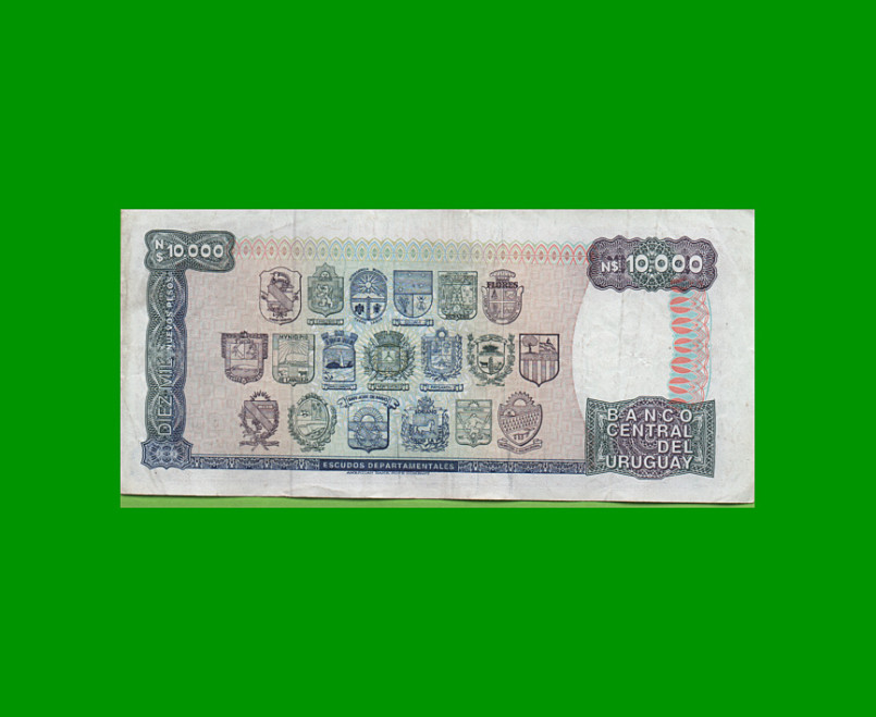 BILLETE DE URUGUAY $10.000,00 N$ PICK 67b, AÑO 1987, SERIE C, ESTADO MUY BUENO.- - Imagen 2