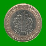 MONEDA DE TURQUIA 1 LIRA, AÑO 2010, BIMETALICA, ESTADO USADA.-