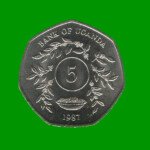 MONEDA DE UGANDA 5 CHELINES, AÑO 1987, ESTADO NUEVA.-