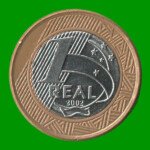 MONEDA DE BRASIL 1 REAL, BIMETALICA, AÑO 2002 ESTADO USADA.-