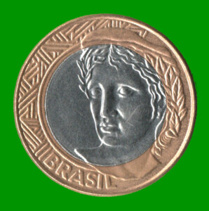 MONEDA DE BRASIL 1 REAL, BIMETALICA, AÑO 2010, ESTADO USADA.-