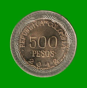 MONEDA DE COLOMBIA $ 500 PESOS, BIMETALICA, AÑO 2012, ESTADO USADA.-