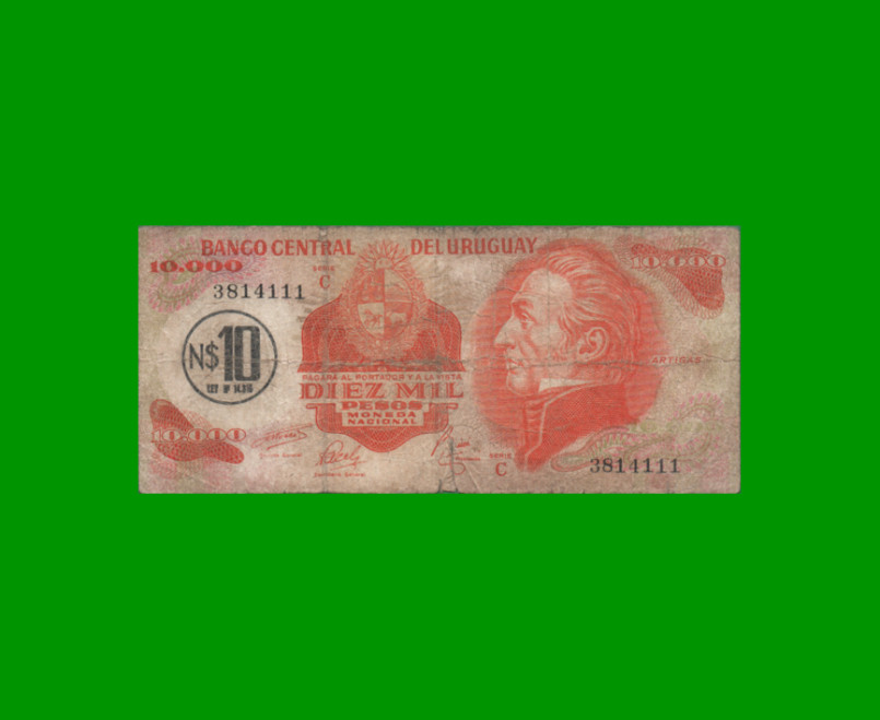 BILLETE DE URUGUAY $10.000 PESOS RESELLADO A 10 N$, PICK 58, AÑO 1975, ESTADO BUENO.-