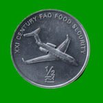 MONEDA DE COREA DEL NORTE 1/2 CHON, AÑO 2002, ESTADO USADA.-